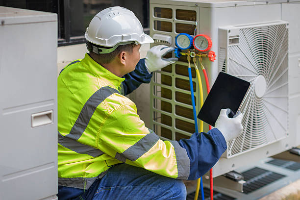 Professional Air Conditioning Repair technician working in Rosenberg, TX